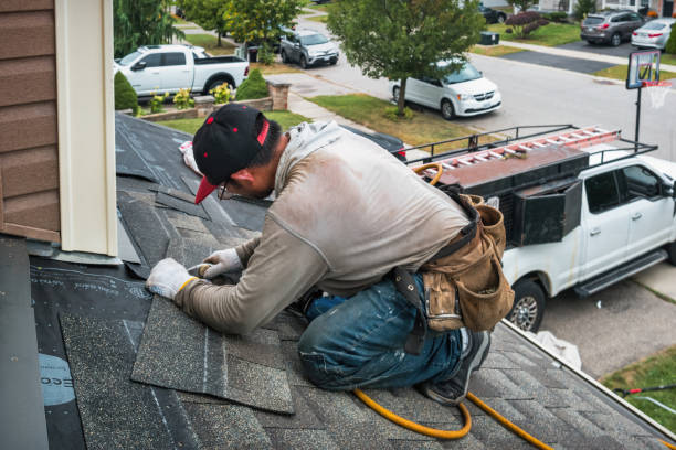 Professional Roofing technician working in Saugus, MA